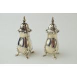 A pair of silver pepper pots, Sheffield 1911, 58.2 grams (2).