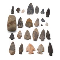 A collection of Antique North American Tribal Arrow Heads 20 in total various and Axe Head in very