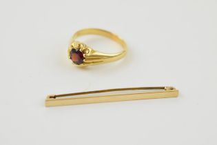 18ct gold ring set with central garnet, size X, 7.1 grams, together with a 9ct gold tie pin with