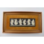 Wedgwood black jasperware Dancing Hours plaque, framed and mounted, 18x33cm. In good condition.