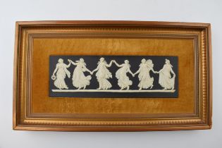 Wedgwood black jasperware Dancing Hours plaque, framed and mounted, 18x33cm. In good condition.