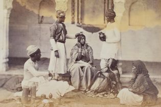 A collection of twenty-two albumen Victorian photo prints of India, to include five signed photos by