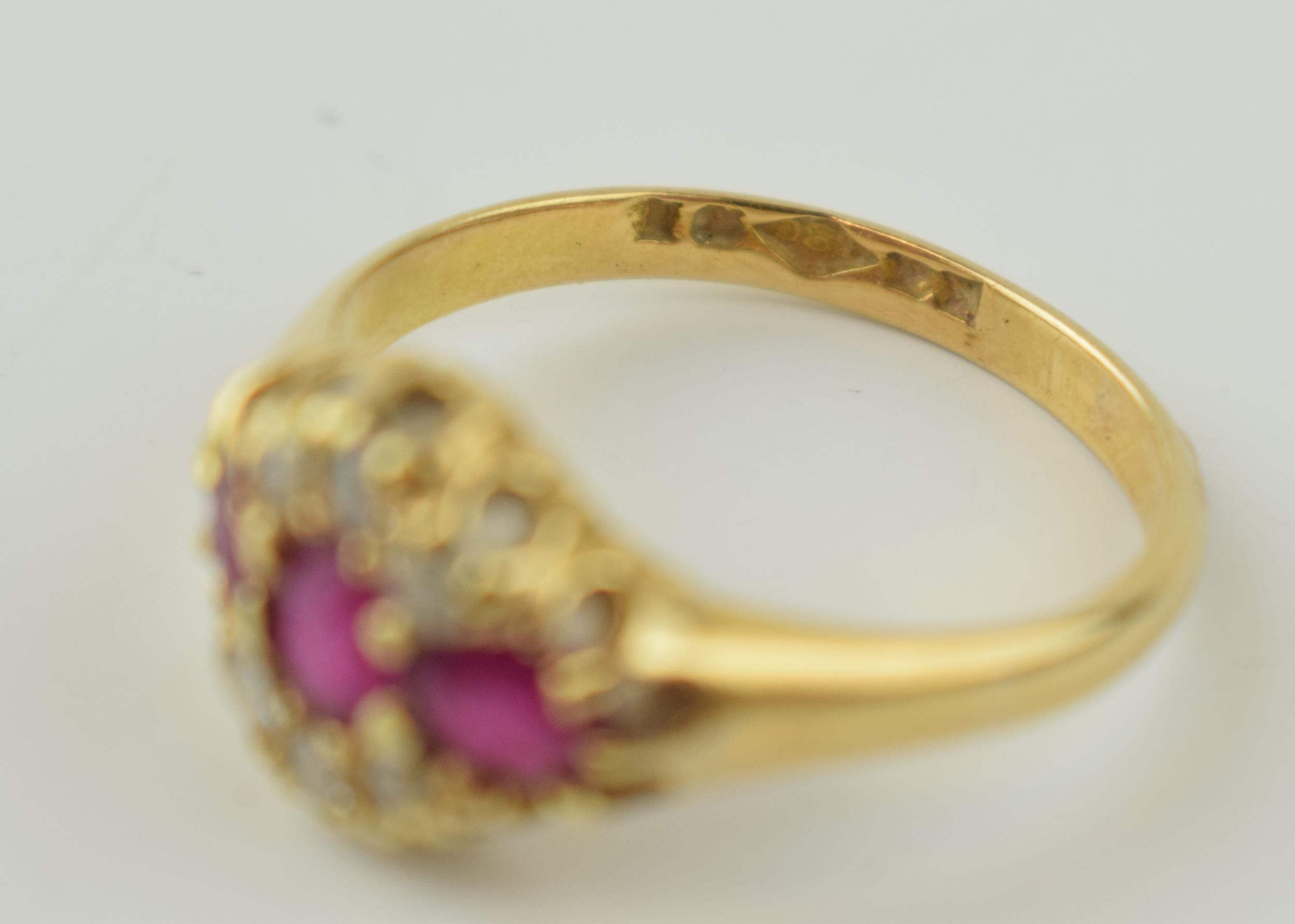 An 18ct yellow gold ladies ring set with three rubies and diamonds. Size P 1/2. Gross weight 3.7 - Image 3 of 3