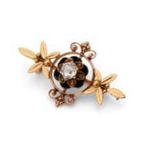 14k gold floral brooch, set with central diamond, circa 0.45/0.5ct, with black enamel, 3.8 grams,