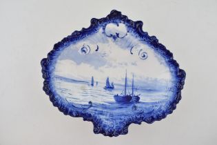 A Royal Crown Derby, hand-painted porcelain, moulded dessert dish, c. 1909. It is decoated with a