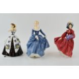 A collection of Royal Doulton figures to include 'Lilac Time' HN 2137, 'Fragrance' HN 2334 (2nd) and