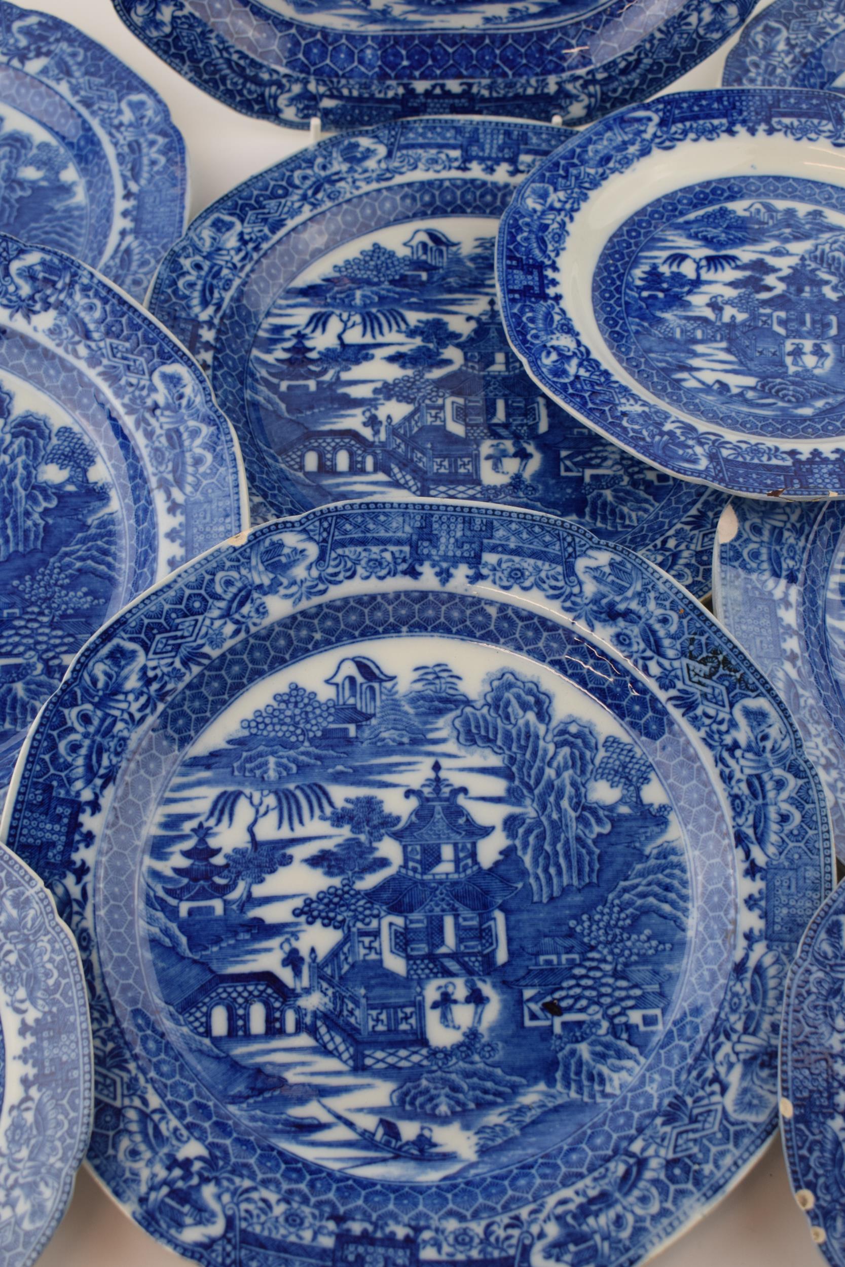 A group of late 18th century pearlware blue and white transfer-printed “Two Figures” pattern - Image 3 of 5