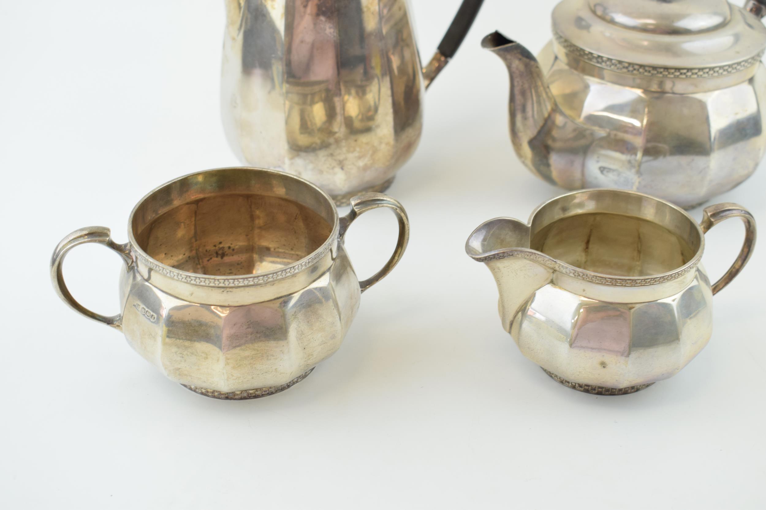 Hallmarked sterling silver tea set, Walker and Hall, Sheffield 1933, to include a teapot, a coffee - Image 3 of 5