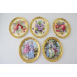 A collection of Paragon gilt decorated painted plaques with romantical scenes and others (5), 13cm