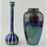 A good pair of iridescent studio art glass to include an onion shaped vase with elongated neck, 27cm