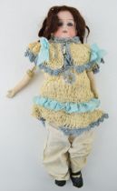 Bisque head doll, kid leather body. Hands missing. AM 370 2/0 made in Germany. Height 43cm. None