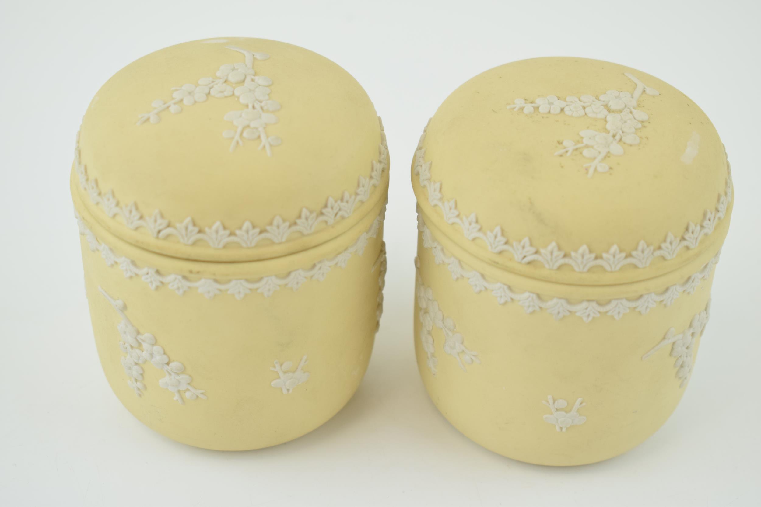 A pair of Wedgwood Jasperware in the yellow / prunus colour, lidded pots, 9.5cm tall. In good - Image 2 of 2