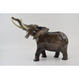 Beswick large elephant with trunk up, 35cm long. In good condition with no obvious damage or