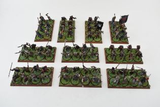 A collection of cast metal and plastic war-games and miniature figures by 'Games Workshop' from