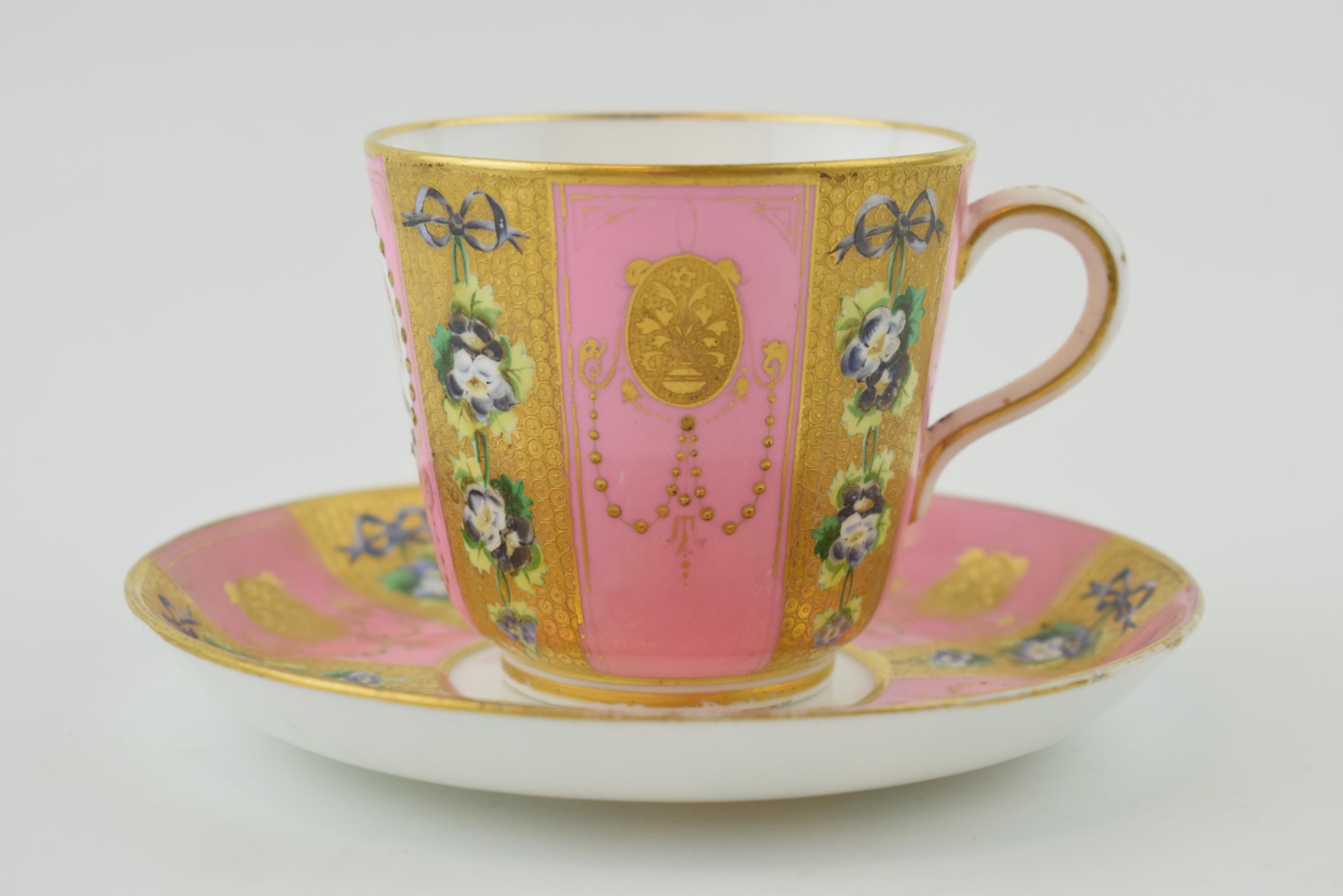 Victorian Minton cup and saucer with heavily gilded decoration, classical design, retailed by