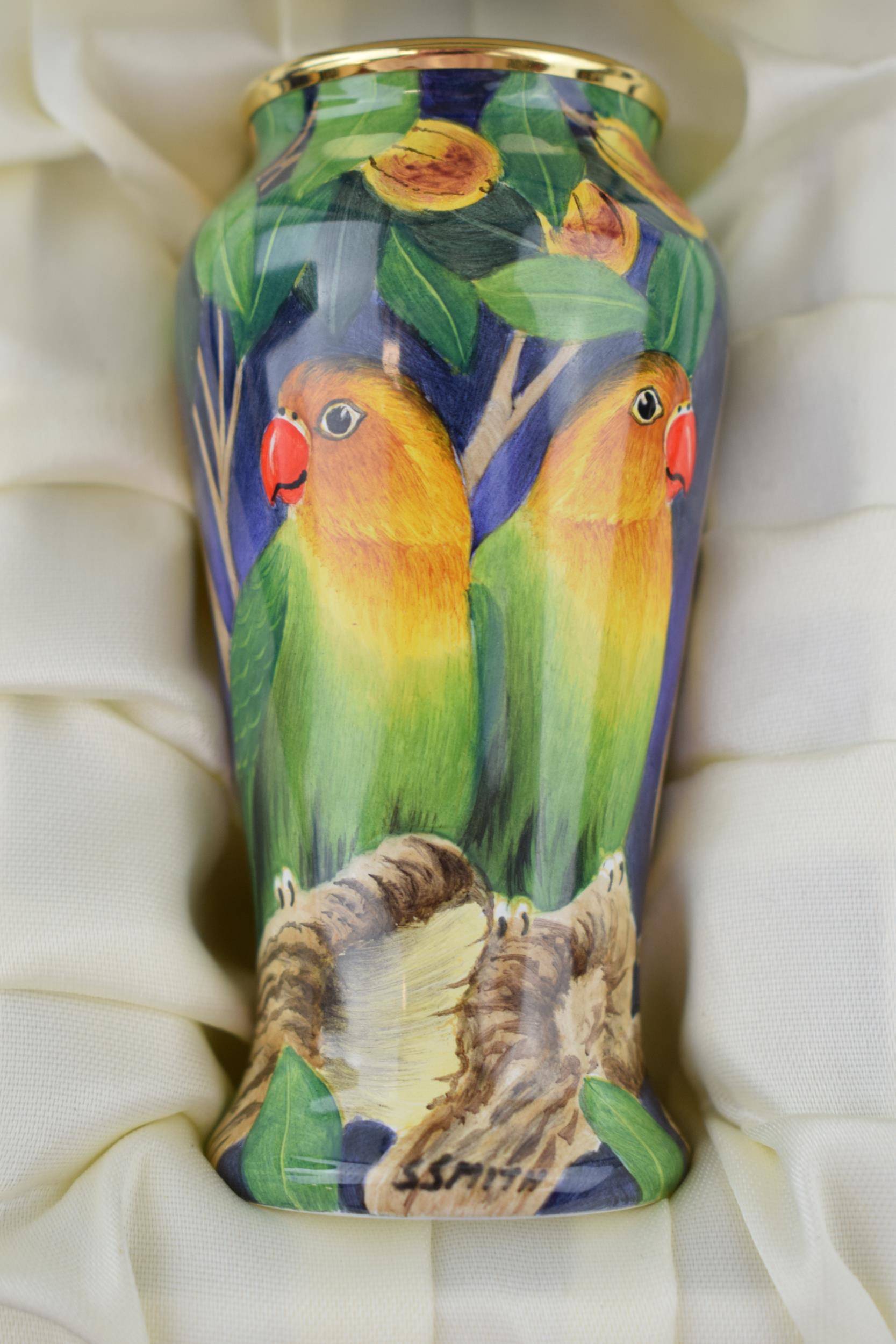 Boxed Moorcroft Enamel vase in the Lovebird pattern, 56/100, by Stephen Smith, 9cm tall. In good - Image 2 of 4