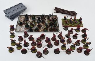 A collection of cast metal and plastic war-games and miniature figures by 'Games Workshop' from