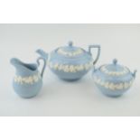 Wedgwood Queensware to include a teapot, a lidded sugar jar and a milk jug (3). In good condition