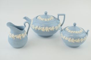 Wedgwood Queensware to include a teapot, a lidded sugar jar and a milk jug (3). In good condition