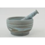 Wedgwood Agate Jasperware mortar and pestle, 13cm diameter. In good condition with no obvious damage