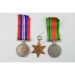 A WWII War Service medal together with a Defence Medal and an Africa Star. (3) In good original
