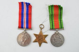 A WWII War Service medal together with a Defence Medal and an Africa Star. (3) In good original
