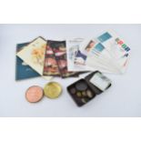 A collection of paper money and coins commemorative medals and a Treasures Exhibition 1857,