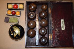 A set of indoor bowls by Henry A. Murton Ltd in lignum vitae in original box together with vintage