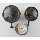 A collection of car clocks to include examples by Smiths, Jaeger and Mercedes. (3) All wind and