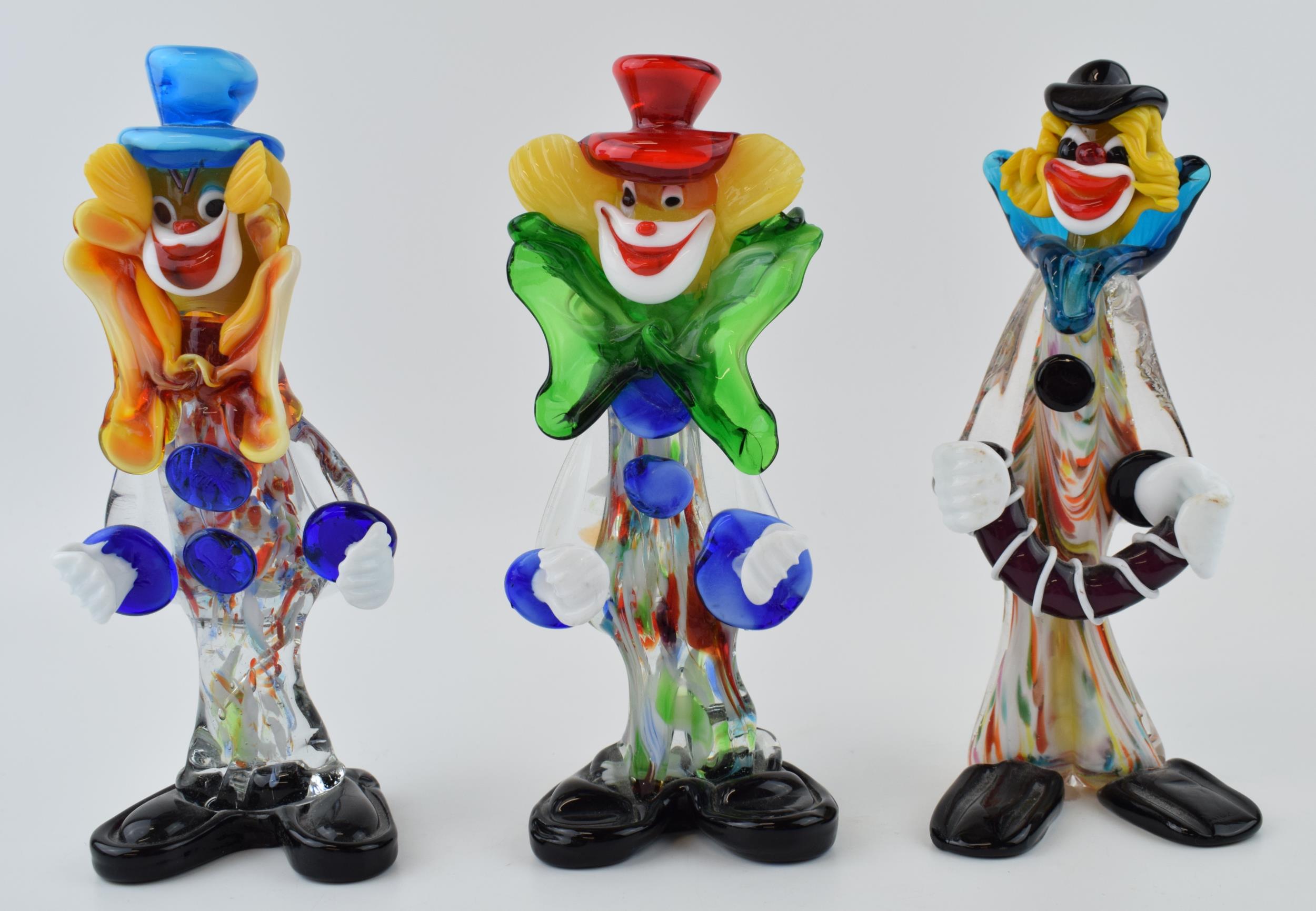A trio of Murano glass clowns, 22cm tall (3). In good condition with no obvious damage or