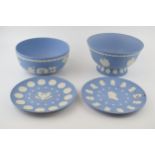 Wedgwood Jasperware in blue to include an American history pedestal bowl, another bowl and 2