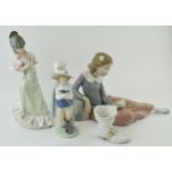 A collection of Nao to include a Cavalier, a boot, a girl in a green dress and a girl playing with