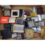 A mixed collection of vintage cigarette lighters to include boxed examples by manufacturers Calibre,