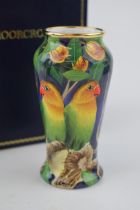 Boxed Moorcroft Enamel vase in the Lovebird pattern, 56/100, by Stephen Smith, 9cm tall. In good