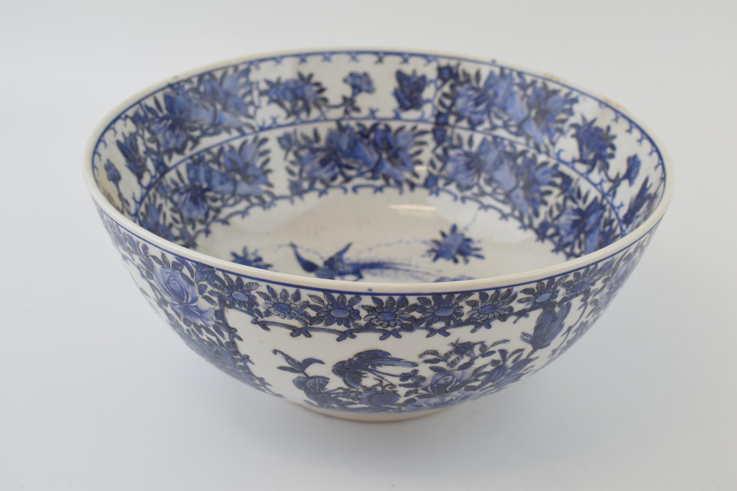 A large blue and white Chinese bowl with character marks to the base. 10” wide. In good condition. - Image 2 of 4