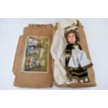 Boxed 'Les Poupees' de Bretagne, papier mache dolls of Brittany. Doll height 32cm. Doll in good