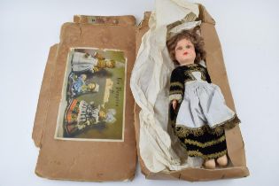 Boxed 'Les Poupees' de Bretagne, papier mache dolls of Brittany. Doll height 32cm. Doll in good