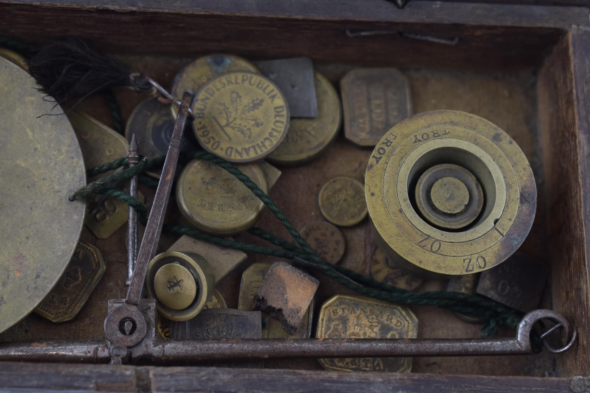 A collection of pocket pan scales with penny weights and graduated Troy Oz weights. 20cm. - Image 3 of 3