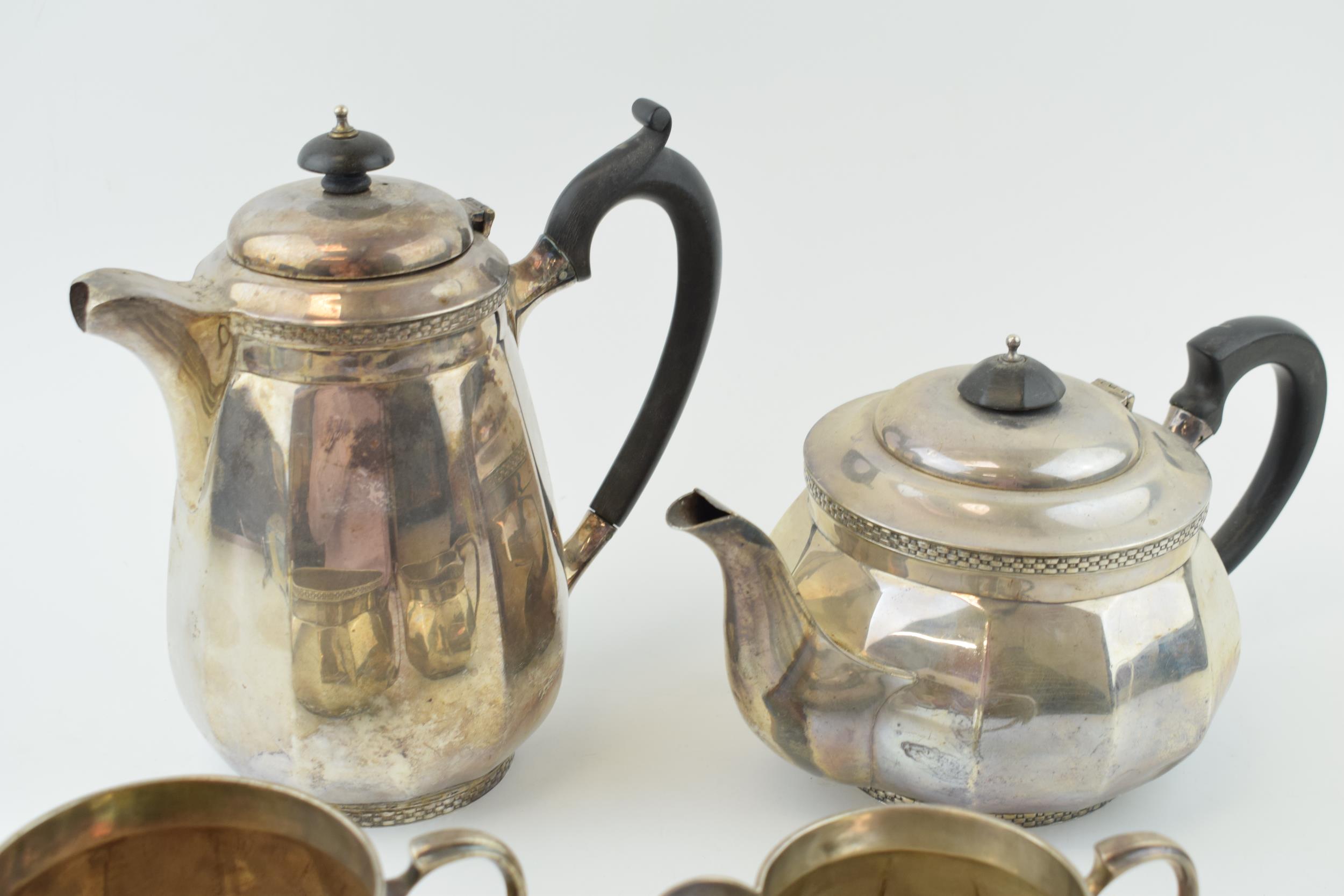 Hallmarked sterling silver tea set, Walker and Hall, Sheffield 1933, to include a teapot, a coffee - Image 2 of 5