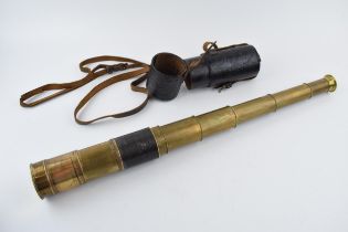 An antique telescope, inscribed 'H.F. Mayes. Dover'. Original leather case and brass end cap. Length