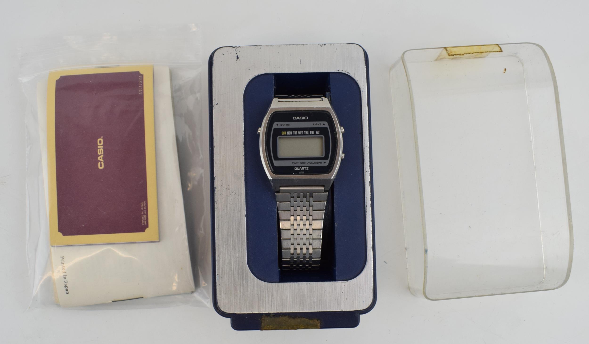 Vintage Casio 31QS-12 Digital LCD Men's Watch, original steel bracelet, box and papers. Case