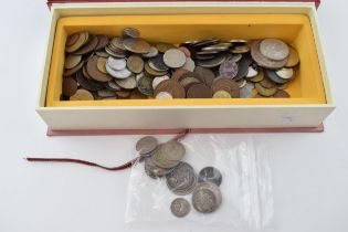 A collection of coins to include mixed silver coinage from various countries and years, combined