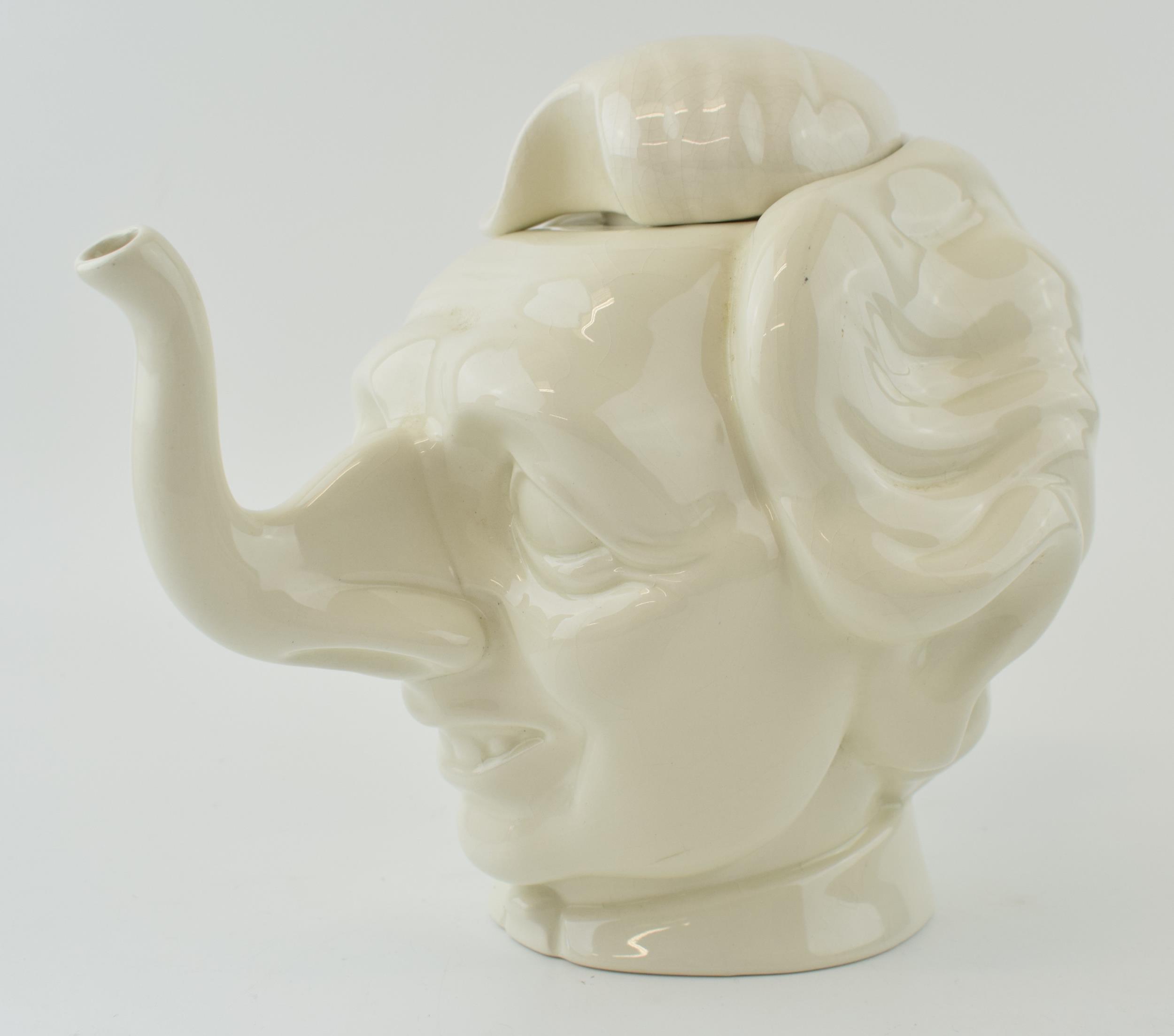 Spitting Image Margaret Thatcher teapot by Fluck and Law, made by Carlton Ware, unmarked, 31cm long.