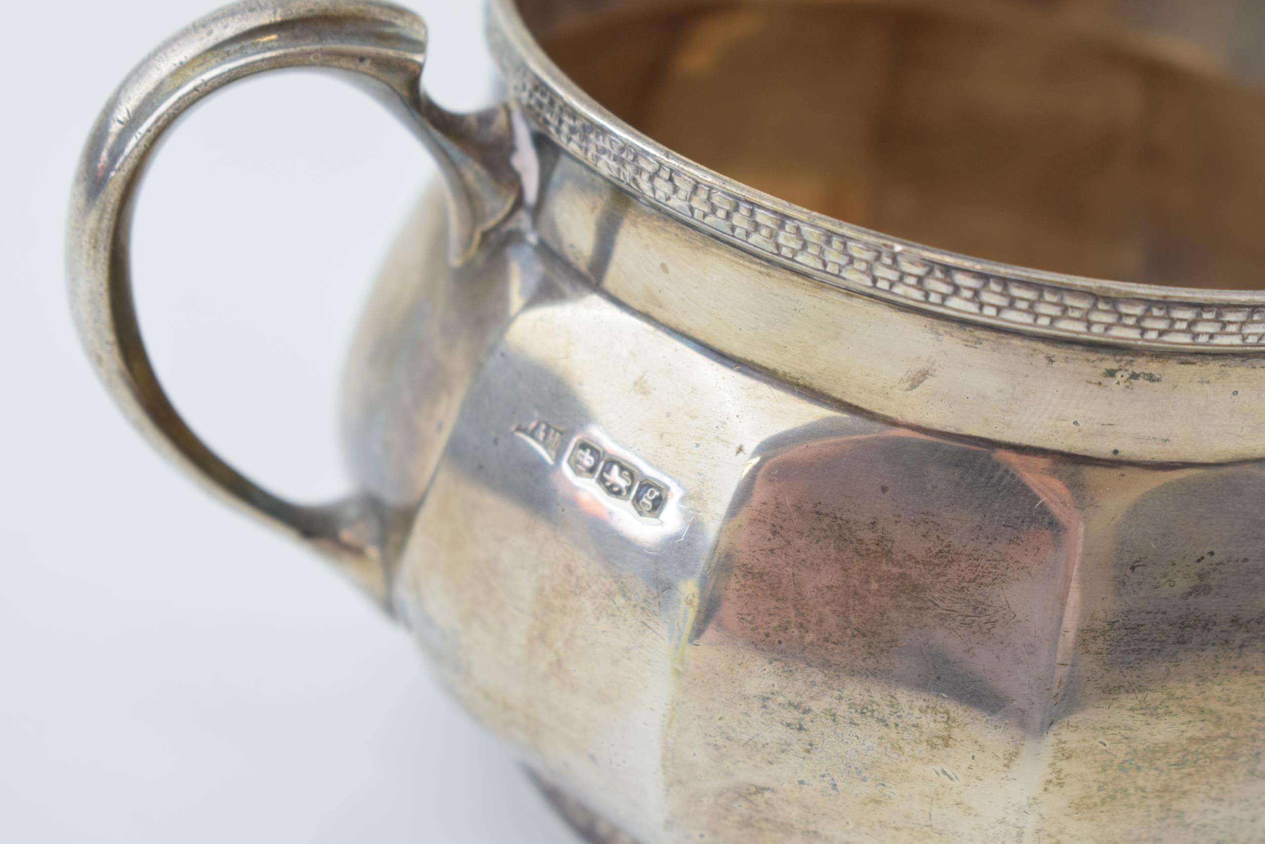 Hallmarked sterling silver tea set, Walker and Hall, Sheffield 1933, to include a teapot, a coffee - Image 4 of 5