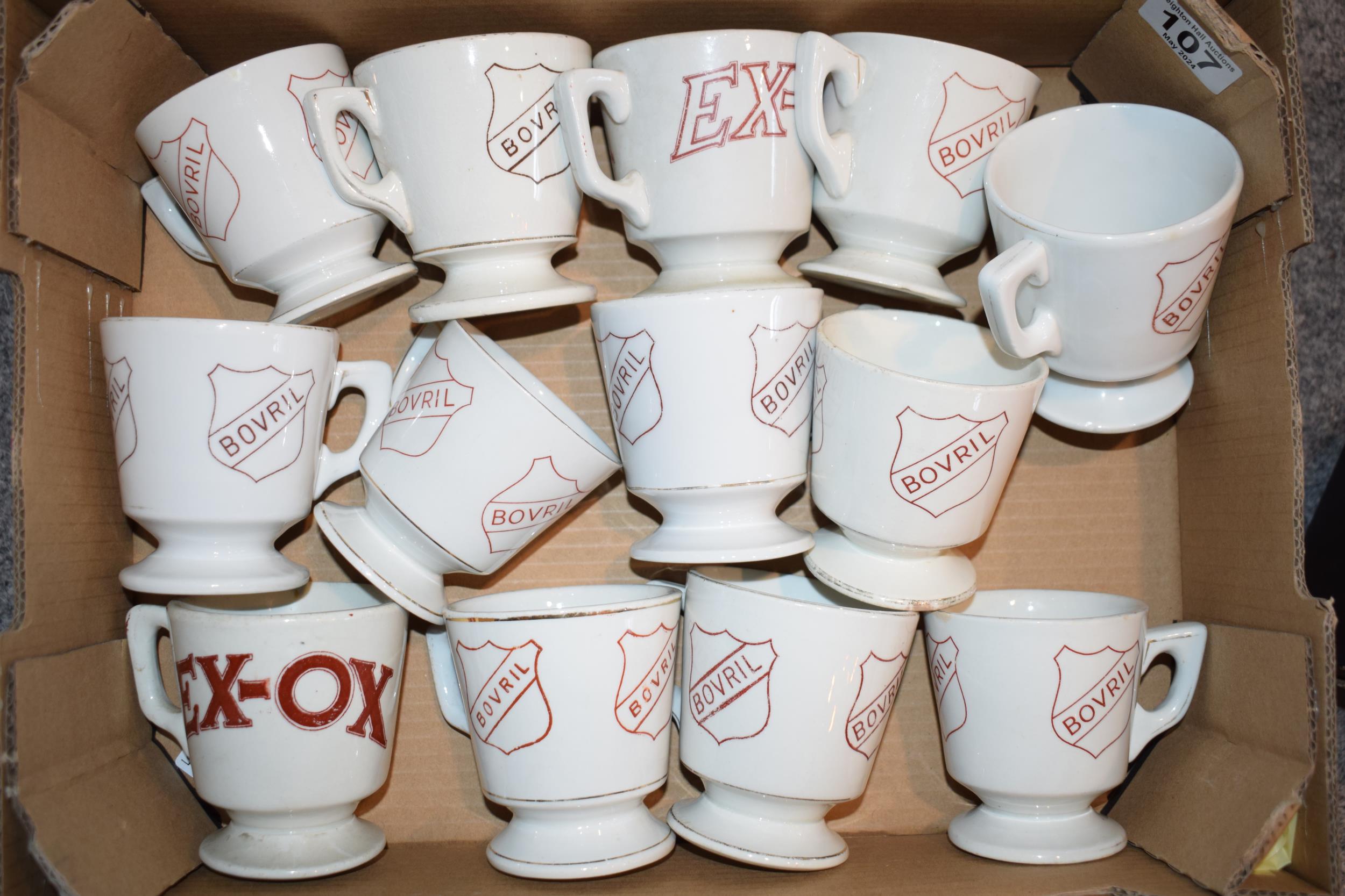 A collection of 'Bovril' and 'Exox' advertising cups to include antique and vintage examples. (13)