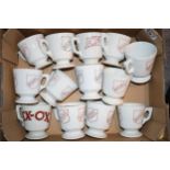 A collection of 'Bovril' and 'Exox' advertising cups to include antique and vintage examples. (13)