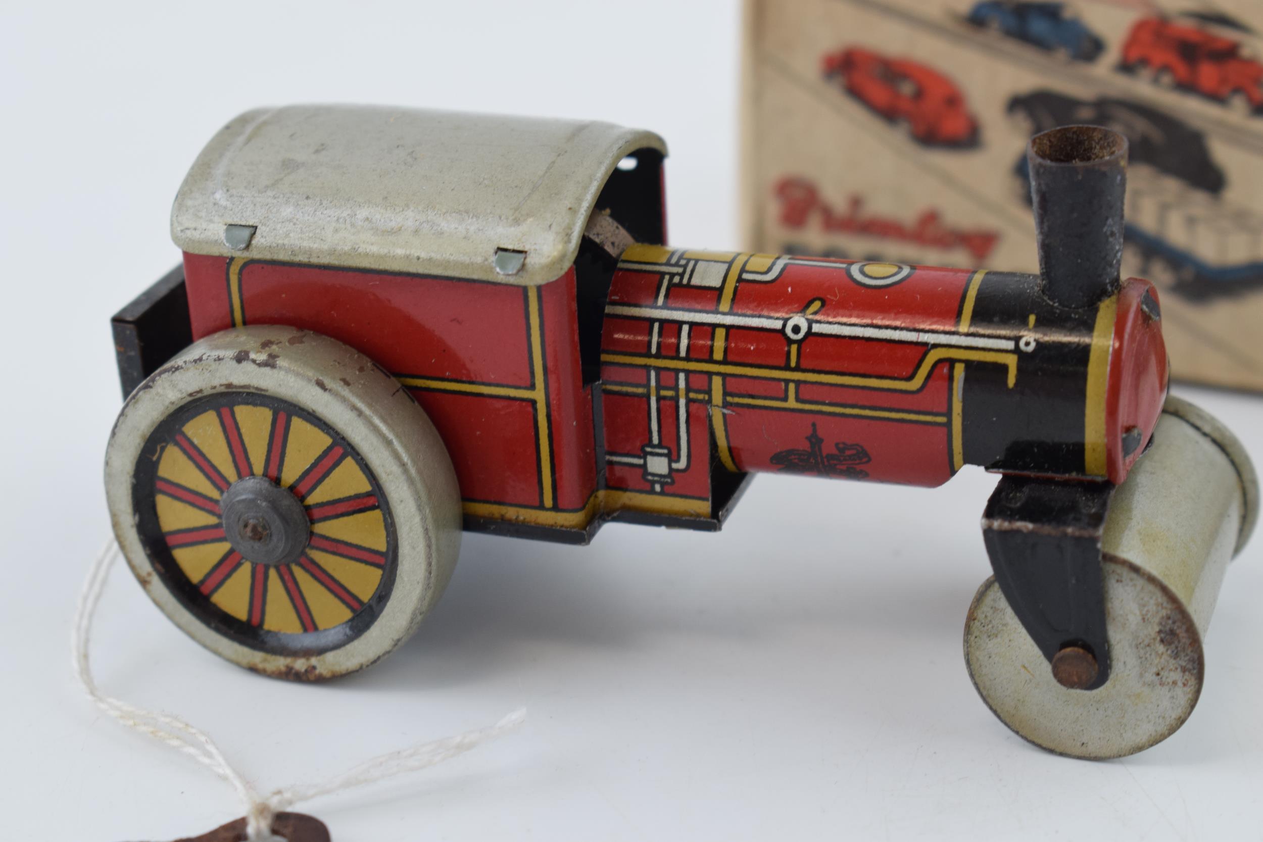 Boxed Brimtoy 'British Made' 9/501 clockwork 'Steamer' tin toy in working order with key. Height - Image 2 of 3