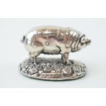 Hallmarked silver cased model of a pig, 6cm long, gross weight 50.0 grams.