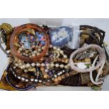 A mixed collection of vintage costume jewellery to include necklaces, brooches, rings and other