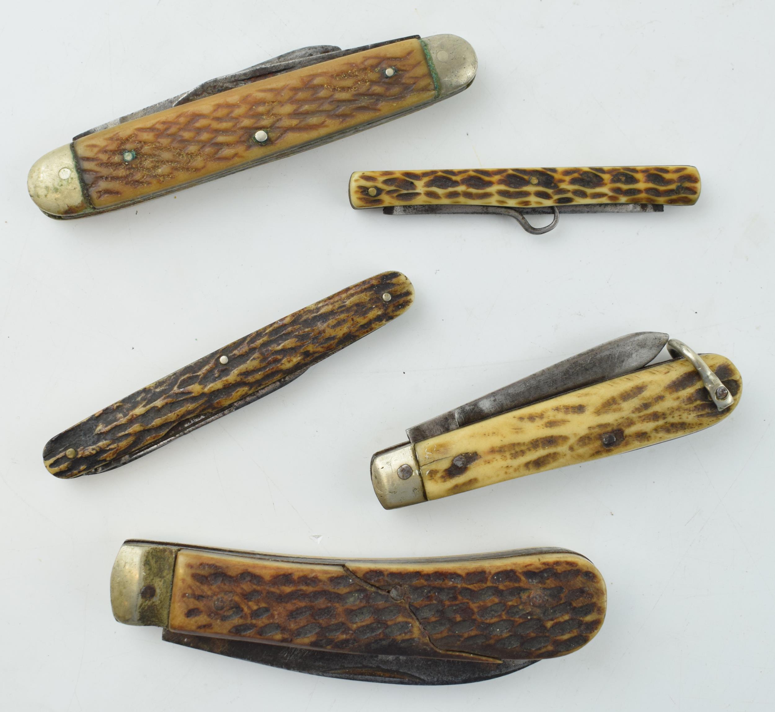 A collection of horn handled pocket knives to include single and double blade examples by